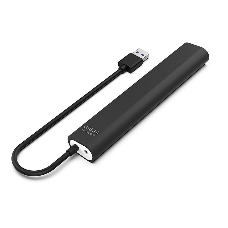 Rear view of black USB hub and attached cable