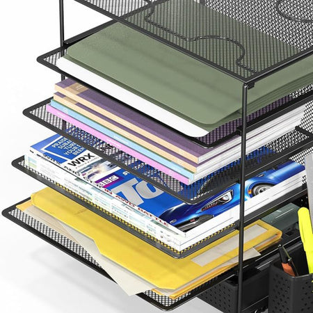 Close-up of mesh document trays with illustrative stationery